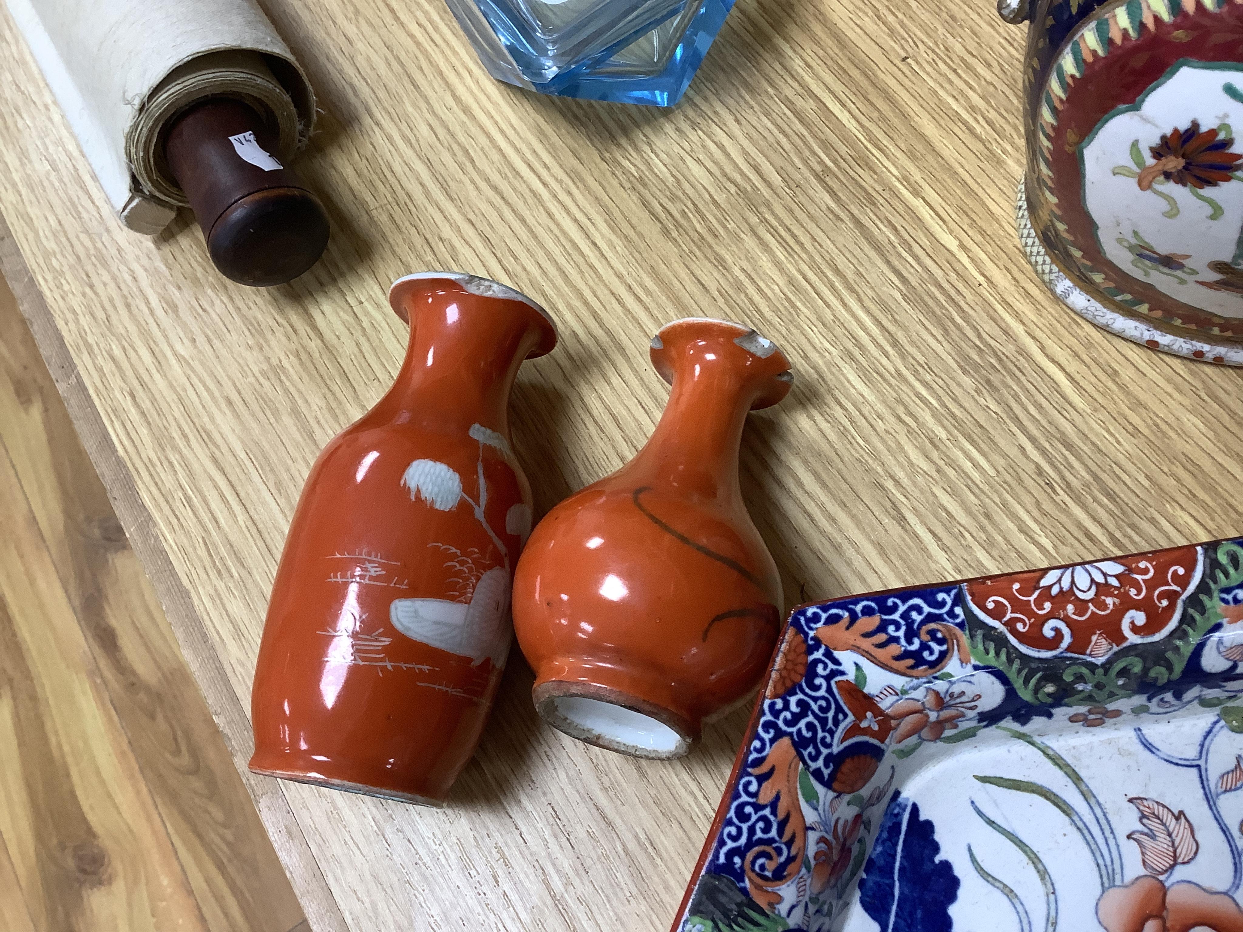 Six Chinese miniature porcelain vases and tea bowls, with wood stands, largest overall 15cm high. Condition - poor to fair